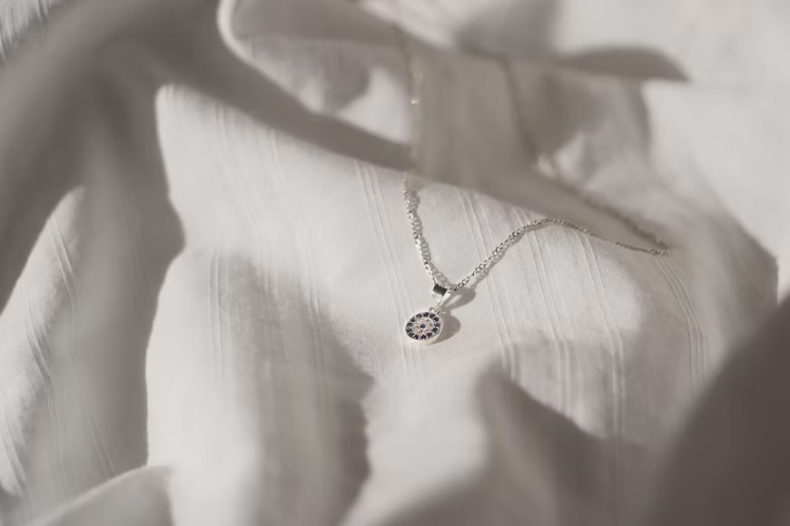 Close detail of a fair-trade handmade necklace in natural light